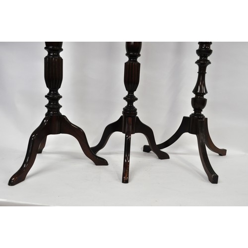 133 - Pair of mahogany pedestals plus one other