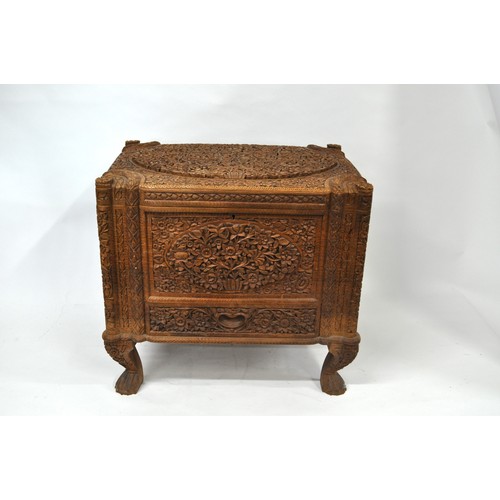 134 - Camphor/wooden trunk with lower drawer.  Features hand-carved floral design on outside and inside th... 