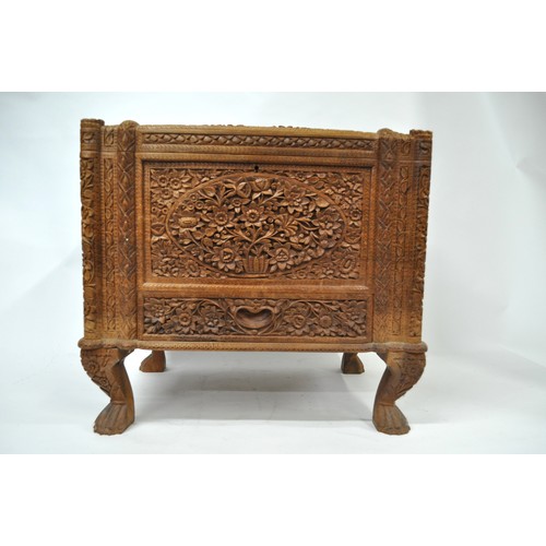 134 - Camphor/wooden trunk with lower drawer.  Features hand-carved floral design on outside and inside th... 