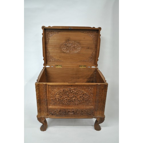 134 - Camphor/wooden trunk with lower drawer.  Features hand-carved floral design on outside and inside th... 