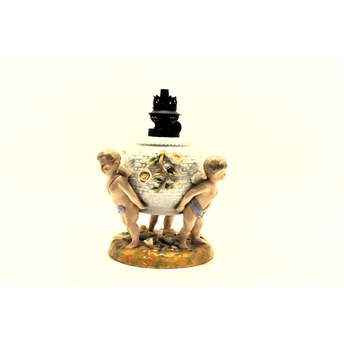 167 - Antique Continental Porcelain lamp base in the form of 3 cherubs supporting woven basket, oil lamp f... 