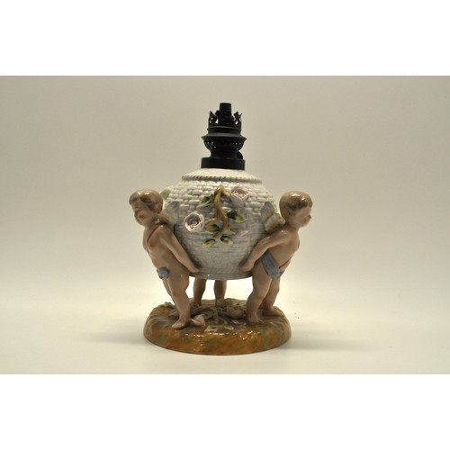 167 - Antique Continental Porcelain lamp base in the form of 3 cherubs supporting woven basket, oil lamp f... 