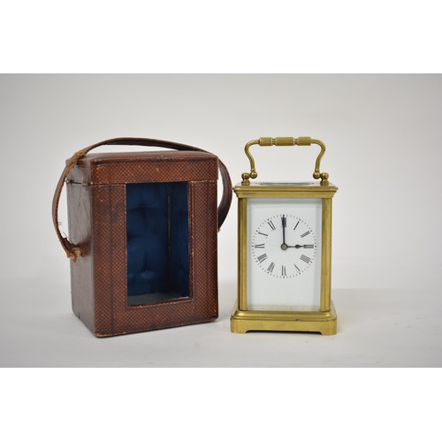 179 - Brass Carriage Clock in leather case, with key. AF