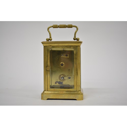 179 - Brass Carriage Clock in leather case, with key. AF