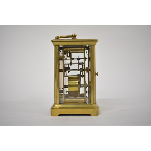 179 - Brass Carriage Clock in leather case, with key. AF