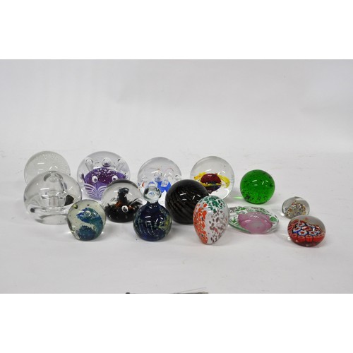 196 - A large selection of paperweights of various design and makers