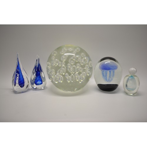 197 - A selection of glass items to include very large bubble orb, decorative paperweights, signed perfume... 