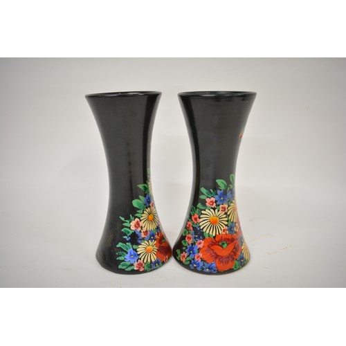 210 - A pair of  vases marked Bourne Denby to base  with hand painted barge ware floral designs