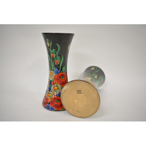 210 - A pair of  vases marked Bourne Denby to base  with hand painted barge ware floral designs