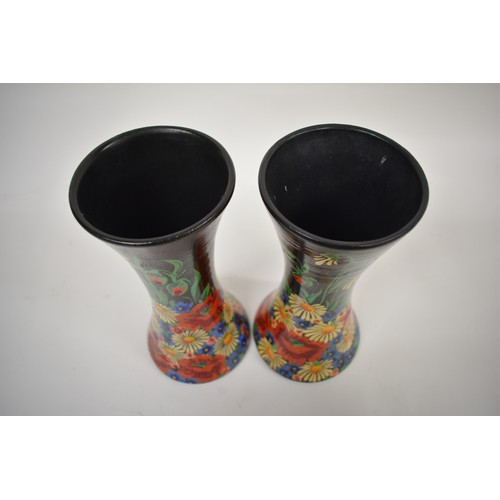 210 - A pair of  vases marked Bourne Denby to base  with hand painted barge ware floral designs