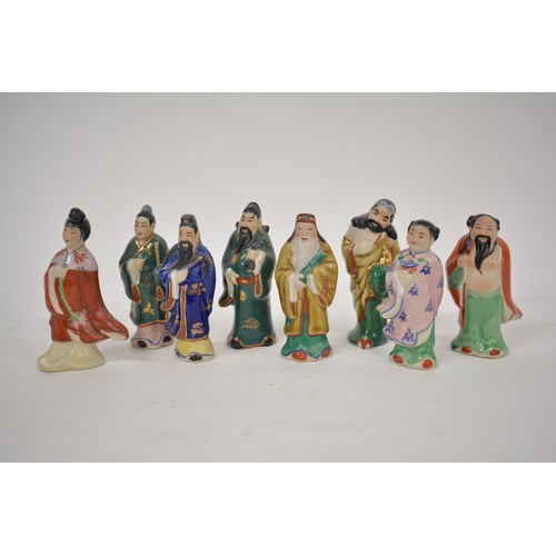 216 - Group of small Chinese immortals (x8) handpainted figures together with small vase