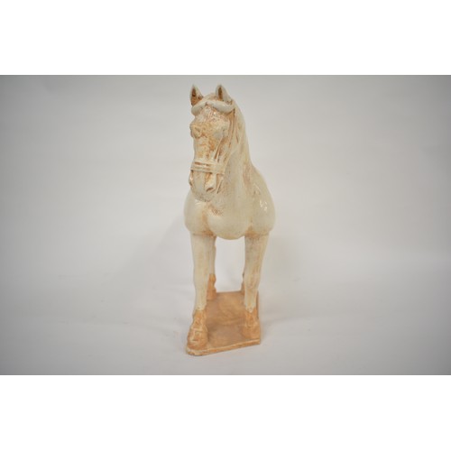 218 - Large Chinese Dynasty Tang style horse figure, with glazed and textured finish. Unsigned. Approx H38... 