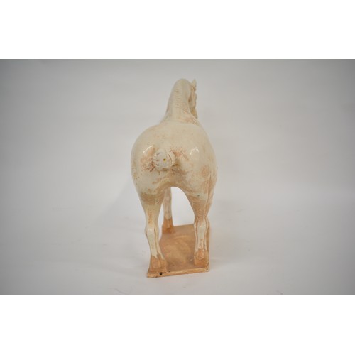 218 - Large Chinese Dynasty Tang style horse figure, with glazed and textured finish. Unsigned. Approx H38... 