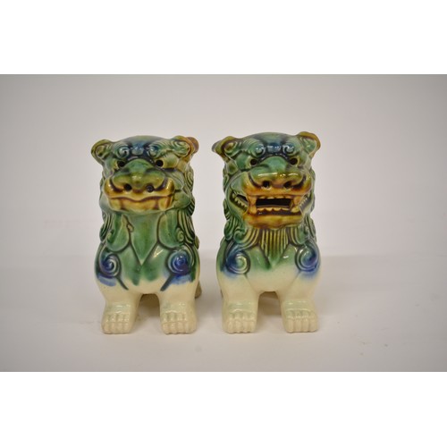 220 - x2 Pairs of ceramic Foo dogs in vibrant blue and green/blue colour schemes