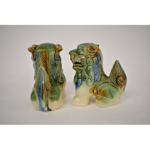 220 - x2 Pairs of ceramic Foo dogs in vibrant blue and green/blue colour schemes