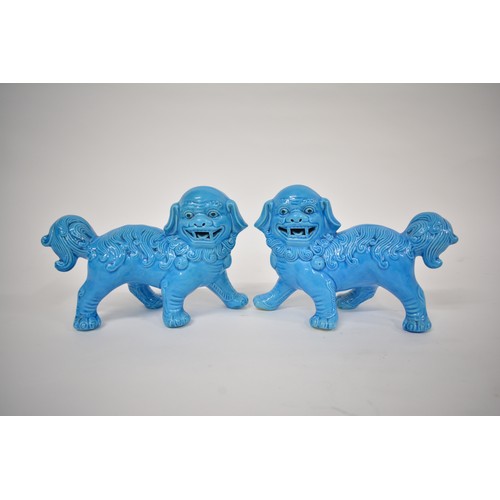 220 - x2 Pairs of ceramic Foo dogs in vibrant blue and green/blue colour schemes