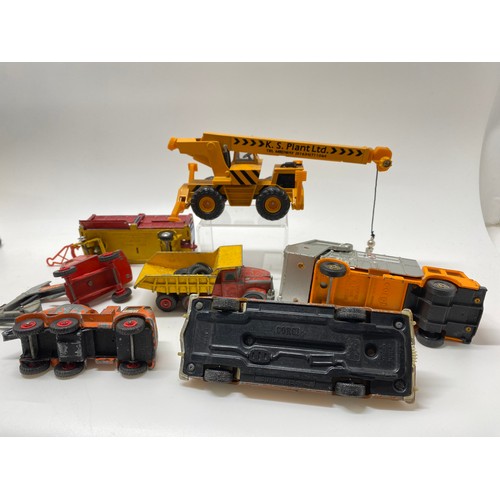 246 - A variety of Dinky and other diecast vehicles, to include industrial, freight, and military-related