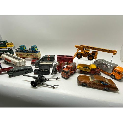 246 - A variety of Dinky and other diecast vehicles, to include industrial, freight, and military-related