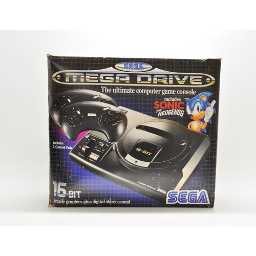 247 - Sega megadrive with games