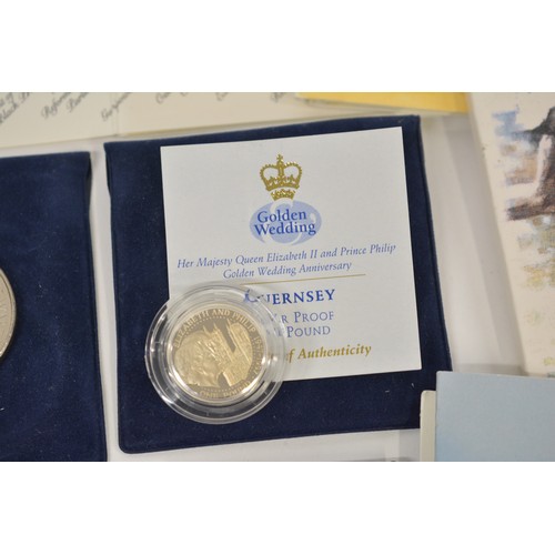 261 - A tin containing mixed coinage consisting of a silver proof Guernsey One Pound, uncirculated £2 and ... 