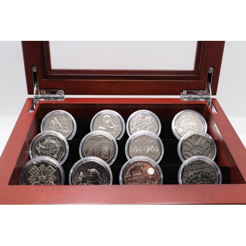 264 - Presentation case containing 2022 50p collection Annual Uncirculated 50p rolls, with key (x132 coins... 