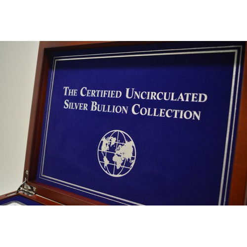 282 - 'The Certified Uncirculated Silver Bullion Collection' A Display chest containing uncirculated silve... 