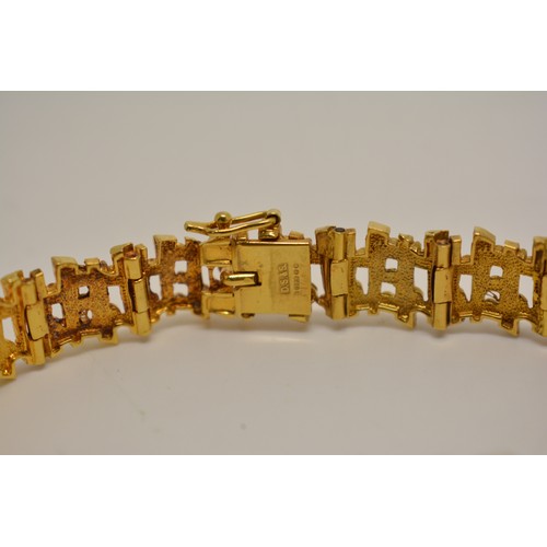 309 - Yellow gold bracelet by D Shackman & Sons, textured link design, hallmarked London 1974 to clasp . A... 