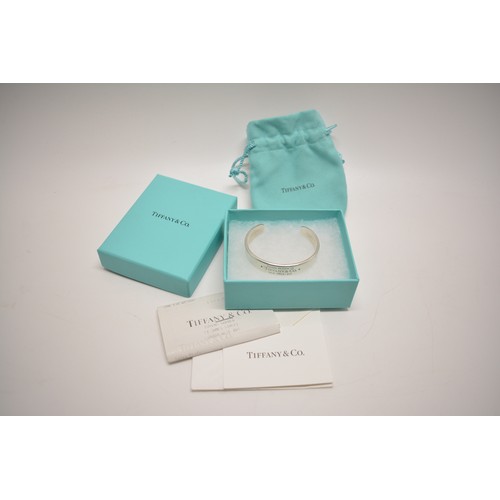 311 - Tiffany & Co Sterling silver cuff bracelet, with diamonds inset into band, complete with box, pouch ... 