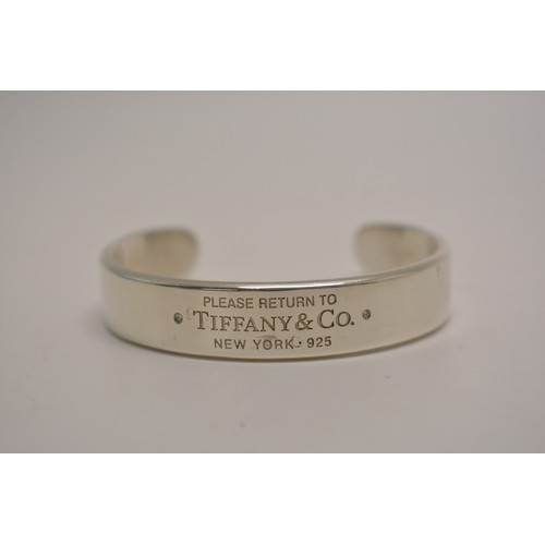 311 - Tiffany & Co Sterling silver cuff bracelet, with diamonds inset into band, complete with box, pouch ... 