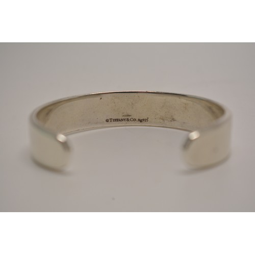 311 - Tiffany & Co Sterling silver cuff bracelet, with diamonds inset into band, complete with box, pouch ... 