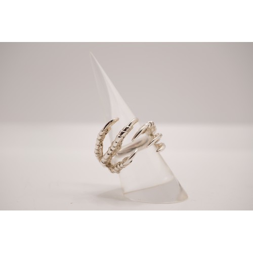 324 - Quirky Tessa Metcalf silver 'Pigeon Grasp' ring in original box.