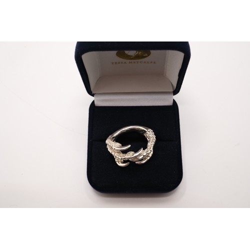 324 - Quirky Tessa Metcalf silver 'Pigeon Grasp' ring in original box.