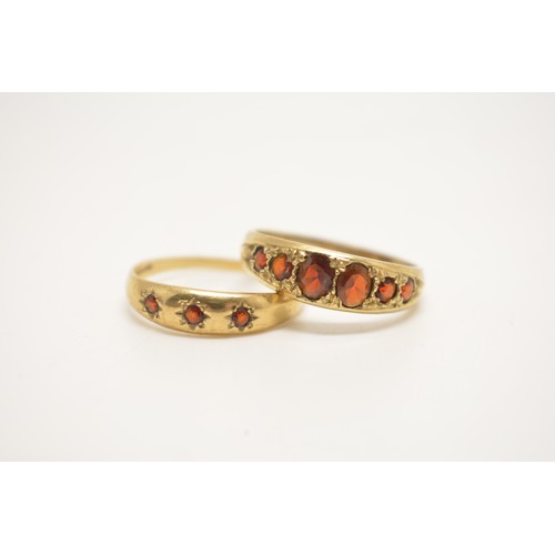 338 - x2 9ct yellow gold rings -  gem set ring with graduating garnets, together with one other tri stone ... 