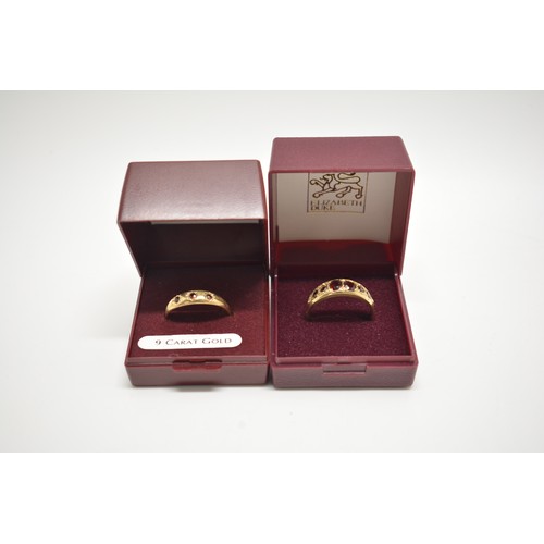 338 - x2 9ct yellow gold rings -  gem set ring with graduating garnets, together with one other tri stone ... 