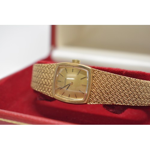 345 - Ladies Omega wristwatch with gold tone watch face, textured strap marked 375, in box. untested