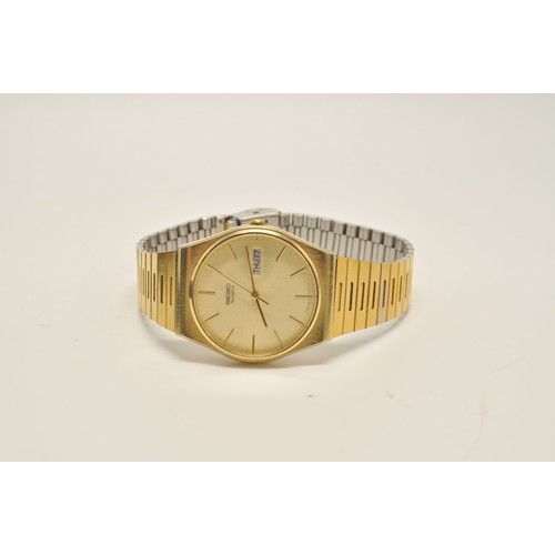 348 - Mens Seiko quartz  watch gold tone  with date window, Japan 6533 - 8000 T , steel back, serial no. 4... 