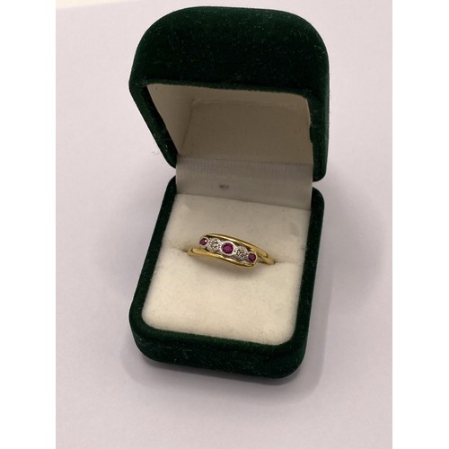 299 - Antique 18ct yellow gold/platinum ruby and diamond ring in box, approx size M/N. Approx weight 2g.