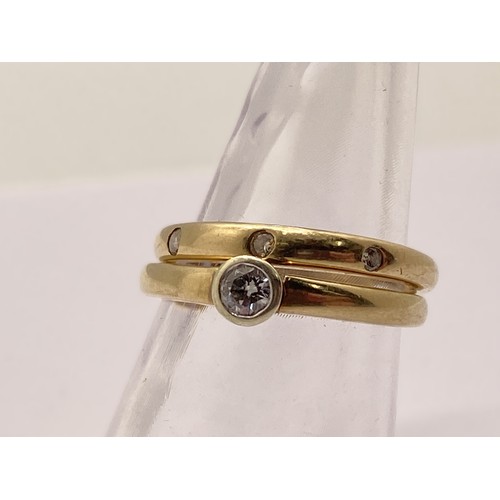 299A - x2 Rings - 9ct gold solitaire diamond ring, together with co-ordinating gold ring with x3 diamonds i... 