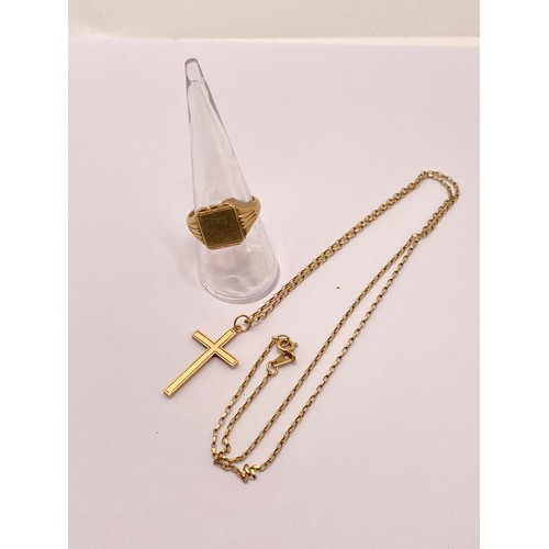 299E - 9ct gold necklace with crucifix together with 9ct yellow gold signet ring. Approx gross weight 9.35.... 