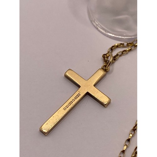 299E - 9ct gold necklace with crucifix together with 9ct yellow gold signet ring. Approx gross weight 9.35.... 