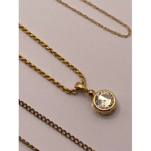 299F - x3 9ct yellow gold necklaces, one with CZ solitaire pendant,  approx gross weight of chains  7.1g