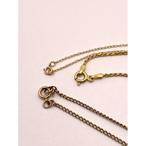 299F - x3 9ct yellow gold necklaces, one with CZ solitaire pendant,  approx gross weight of chains  7.1g