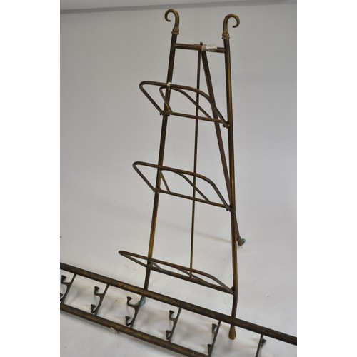 61 - Maison Jansen style folding newspaper rack, together with wall hanging swivelling hook coat rack