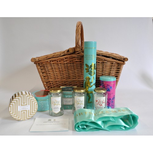 69 - Fortnum & Mason wicker hamper and F&M picnic basket containing empty canisters etc,  with original t... 