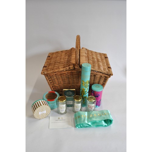 69 - Fortnum & Mason wicker hamper and F&M picnic basket containing empty canisters etc,  with original t... 