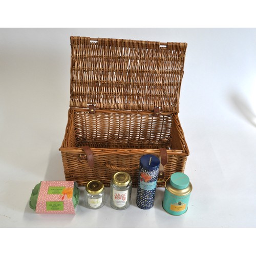 69 - Fortnum & Mason wicker hamper and F&M picnic basket containing empty canisters etc,  with original t... 