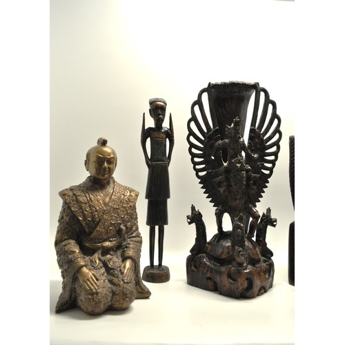 101 - Group of African/Indonesian/Chinese, including Deity, to include some hardwood carved items