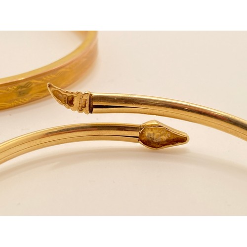 192 - 9ct gold bangle with decorative engraved design hallmarked Chester, 9.65g, together with one other 9... 