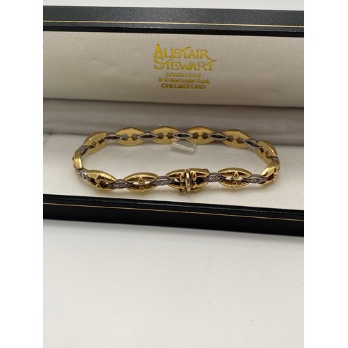 199 - 9ct gold and diamond bracelet, hallmarked 375. approx gross weight 14.5g. AF.