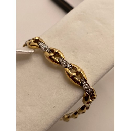 199 - 9ct gold and diamond bracelet, hallmarked 375. approx gross weight 14.5g. AF.